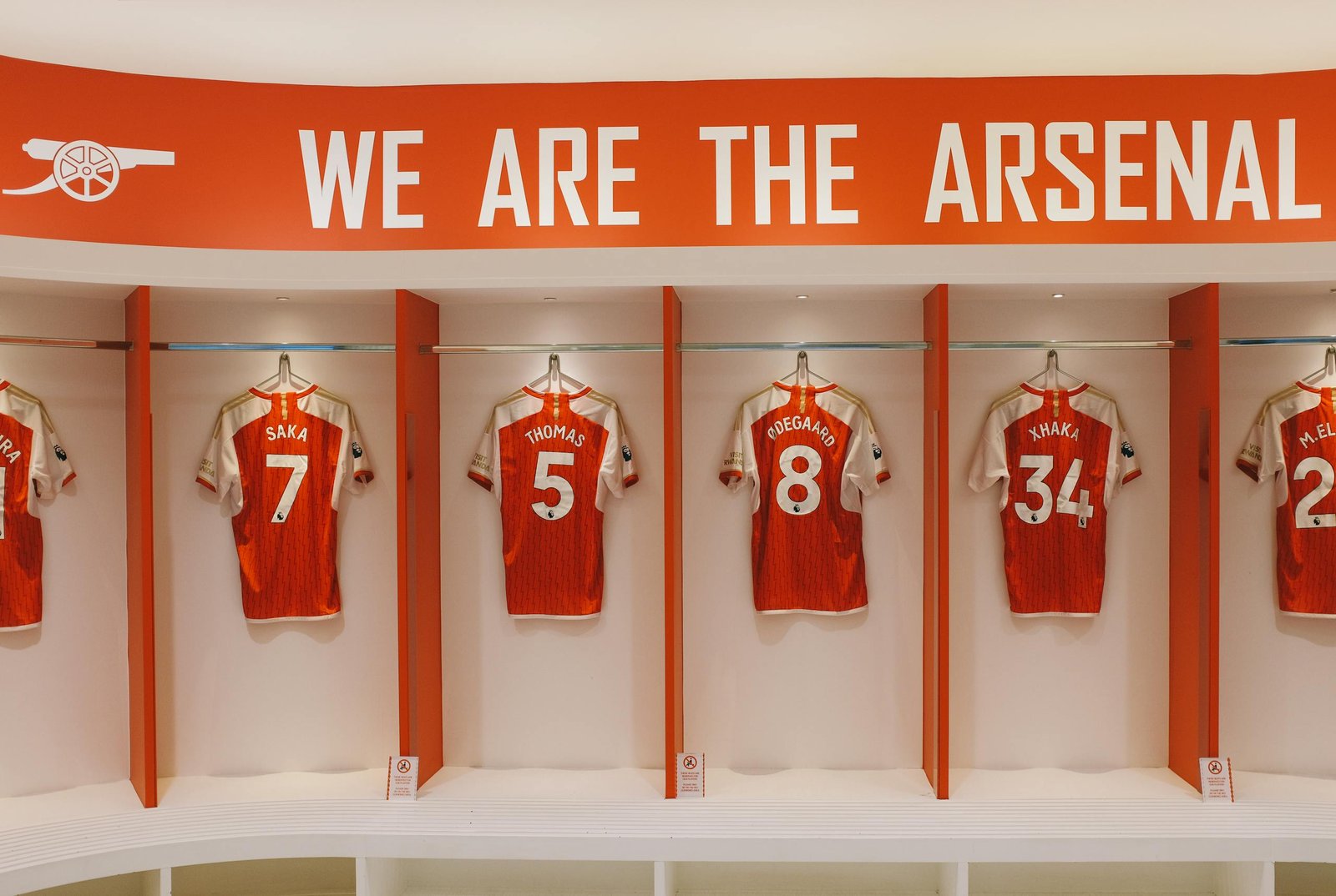 Arsenal FC jerseys on display in the Emirates Stadium locker room, London.